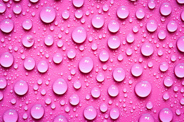 Water Drops On Violet Background.