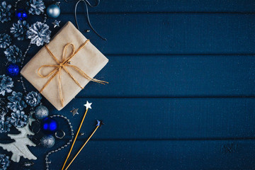 blue christmas background with gift and cones