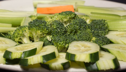 One Carrot, Broccoli Heads, Cucumber Slices and Celery Sticks 3