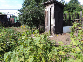 village wooden toilet outside