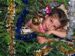 Happy small girl with present have a christmas