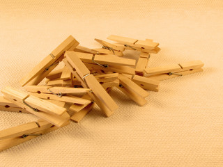 a lot of clothes pegs on the table