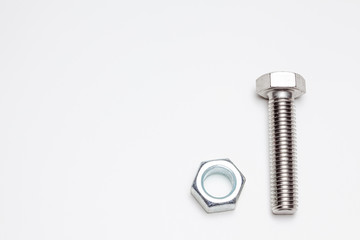 one lying bolt and one nut