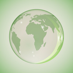 Earth in a glass globe in green