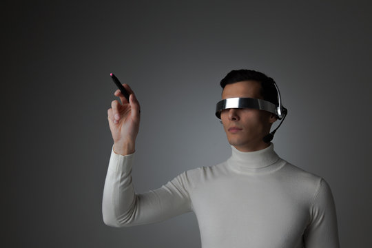 Man using futuristic VR goggles