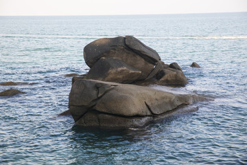 Samui Island. A beautiful view of the large round stones and the ocean. Coast of the sea, clear sky.