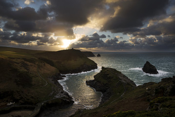 sunset with cloudy sky at boscastle , cornwall, uk