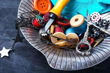 Buttons, scissors and thread