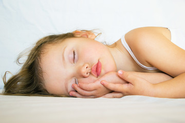 Fototapeta premium sleeping baby. the child is tired