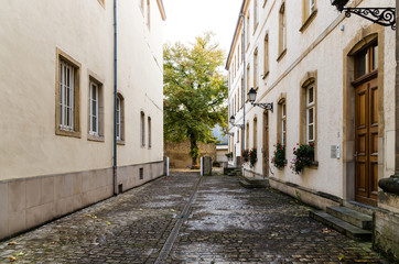 Fototapeta na wymiar Alley by the Trinity Church in Luxembourg City, Luxembourg