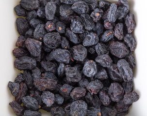 Black raisins.