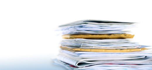 stack of mail on white background 