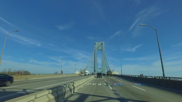 POV driving onto Verrazano Narrows Bridge from Staten Island to Brooklyn