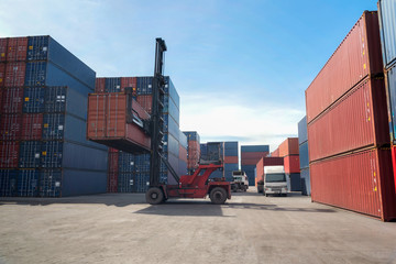 Industrial Container yard with forklift working in the morning
