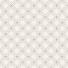 Regularly repeating geometric tiles of rhombuses.