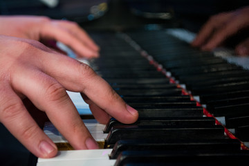 Fototapeta na wymiar man playing piano
