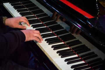 Fototapeta premium man playing piano