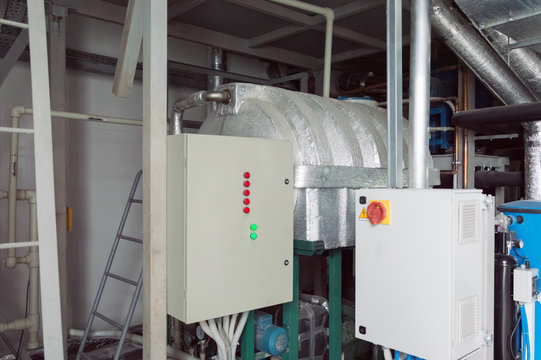 Two closed ventilation system control cubicles in the industrial ventilation room