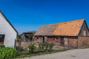Fototapeta na wymiar Old farm in Lacko, small village near Baltic Sea coast in Poland
