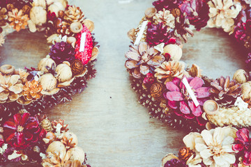 Christmas flowers wreaths decorations in Cracow Christmas market in Poland.