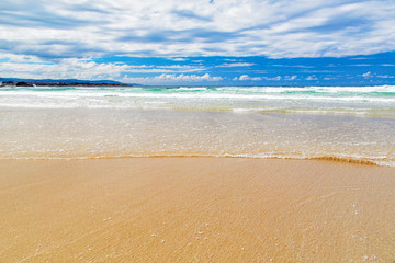 The leaving wave on the beach