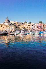 Marina Grande Port with colorful old houses of Procida island, Italy
