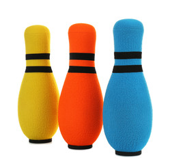 Toy bowling pins on white background