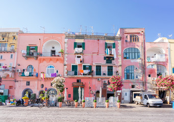 Fototapeta na wymiar Procida island with colorful houses in small town street, Italy