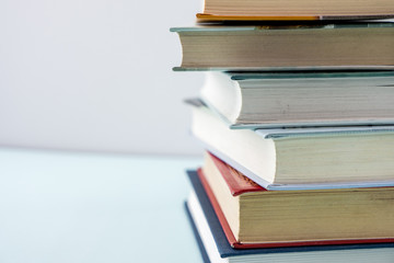 Education concept - books on the gray background 