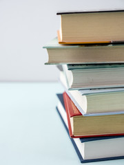 Education concept - books on the gray background 