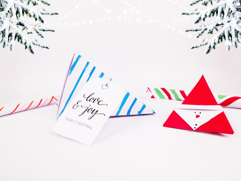 Christmas Decoration with Blue Triangle Wafers Gift Box with candy cane and christmas tree with snow falling  for holidays best for background image for Holiday invitation and banners and blogs