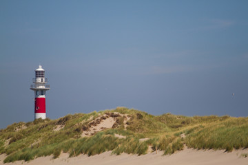 Fototapeta na wymiar Lighthouse on a beach in Nieuwpoort, Belgium