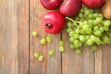 Fresh fruits on wooden table
