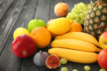Fresh fruits on wooden table