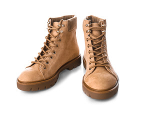 Pair of stylish female boots on white background