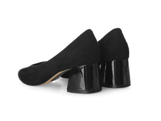 Pair of black female shoes on white background