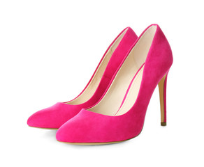 Pair of classic female shoes on white background