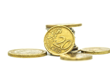 Coin pile, Mexican peso money on solid white background.