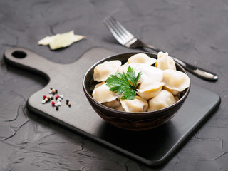 Russian pelmeni, ravioli, dumplings with meat