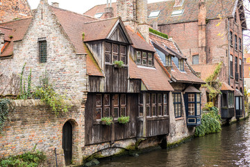 Brugge, Belgium - November, 2017. Brugge medieval historic city. Brugge streets and historic center. canals and buildings. Brugge popular touristic destination of Belgium.