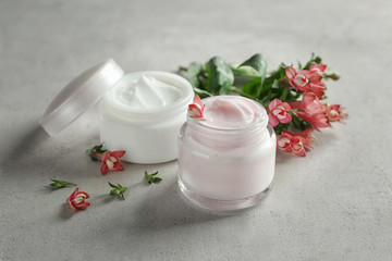 Obraz na płótnie Canvas Jars of body cream on table