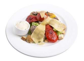 Warm veal salad with vegetables.