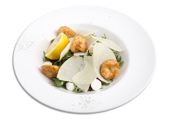 Arugula salad with prawns.