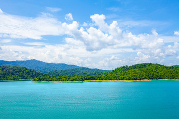 Fototapeta na wymiar lake in deep mountain forest of Ratchaprapa Dam Chaew Lan Dam Surat Thani Thailand