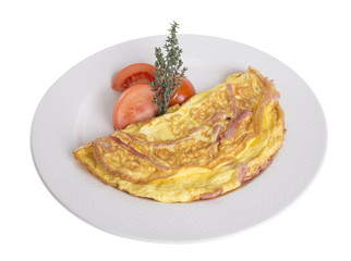 Omelet with ham and tomatoes.