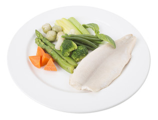 Steamed trout fillet with vegetables.