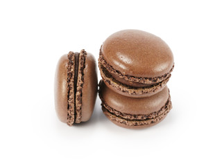 three chocolate macarons isolated on white
