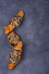 Croissants with toping from chocolate and almonds