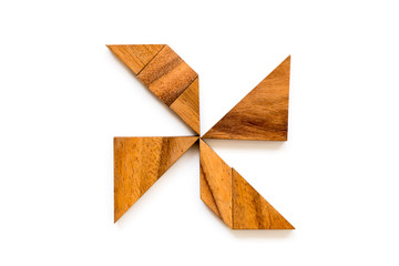 Wood tangram puzzle in turbine shape on white background