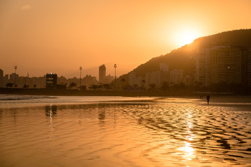 Fototapeta premium Santos Beach and Urubuquecaba island at sunset - Santos, Sao Paulo, Brazil